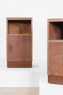 Lot 60 - A pair of limed oak bedside cupboards