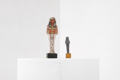 Lot 666 - An Egyptian painted limestone ushabti