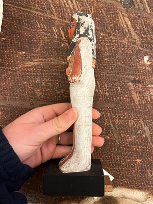 Lot 666 - An Egyptian painted limestone ushabti