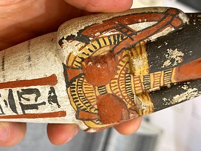 Lot 666 - An Egyptian painted limestone ushabti