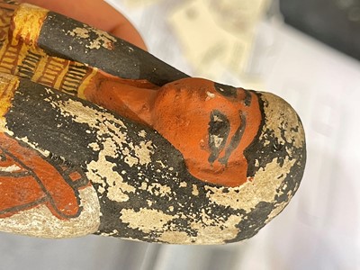 Lot 666 - An Egyptian painted limestone ushabti