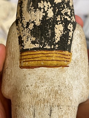 Lot 666 - An Egyptian painted limestone ushabti