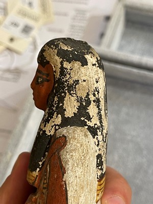 Lot 666 - An Egyptian painted limestone ushabti