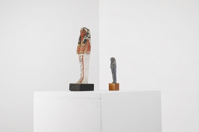 Lot 666 - An Egyptian painted limestone ushabti