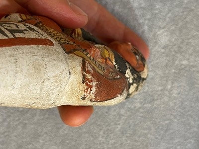 Lot 666 - An Egyptian painted limestone ushabti