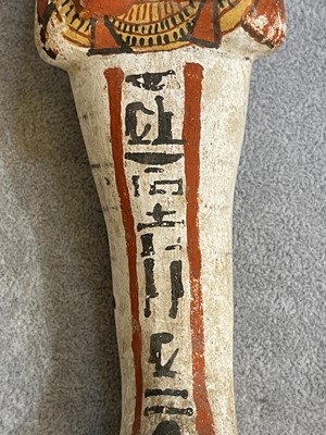 Lot 666 - An Egyptian painted limestone ushabti