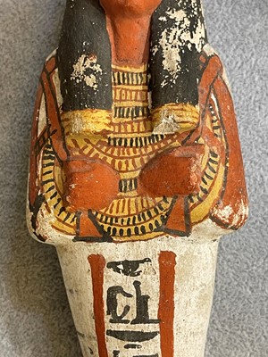 Lot 666 - An Egyptian painted limestone ushabti