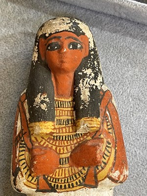 Lot 666 - An Egyptian painted limestone ushabti