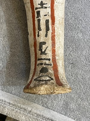 Lot 666 - An Egyptian painted limestone ushabti