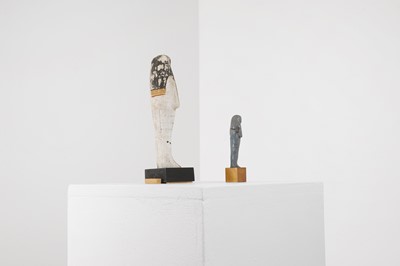 Lot 666 - An Egyptian painted limestone ushabti