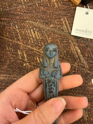 Lot 666 - An Egyptian painted limestone ushabti