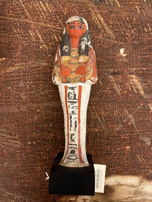 Lot 666 - An Egyptian painted limestone ushabti