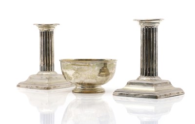 Lot 33 - A pair of silver candlesticks