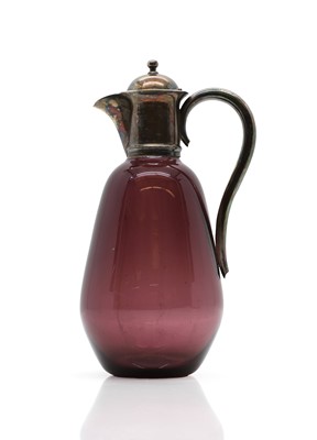 Lot 13 - A late Victorian silver and amethyst glass carafe