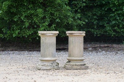 Lot 679 - A pair of buff terracotta garden pedestals