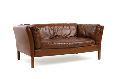 Lot 500 - A two-seat leather sofa