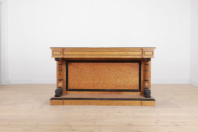 Lot 670 - A Charles X-style simulated maple console table