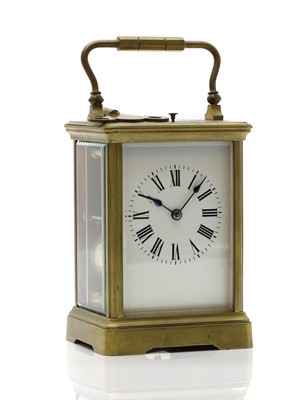 Lot 260 - A brass carriage clock