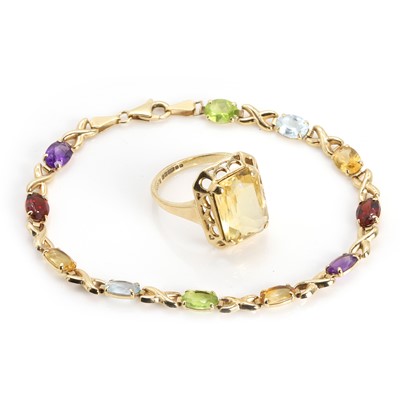 Lot 291 - A 9ct gold vari colour gemstone bracelet and a single stone citrine ring