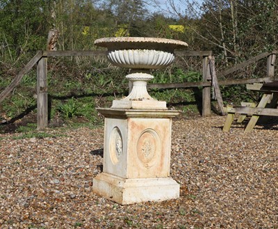 Lot 454 - A large painted cast iron urn and stand