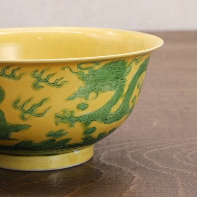 Lot 89 - A Chinese yellow-ground green-enamelled bowl