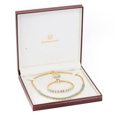Lot 189 - A gold and blue topaz jewellery suite