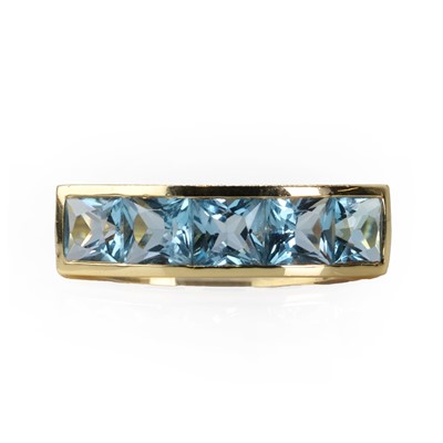 Lot 189 - A gold and blue topaz jewellery suite