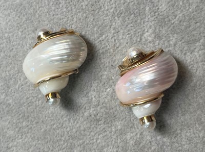Lot 104 - A pair of Turbo Shell clip earrings, by Seaman Schepps