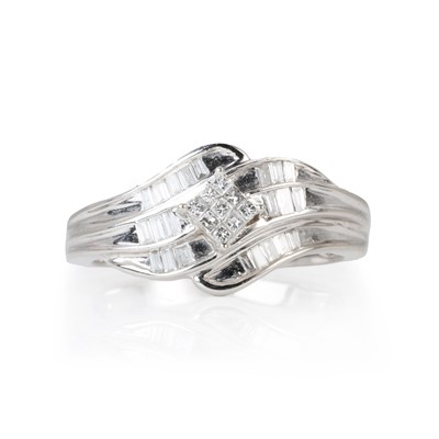 Lot 144 - A 9ct white gold diamond set crossover style ring