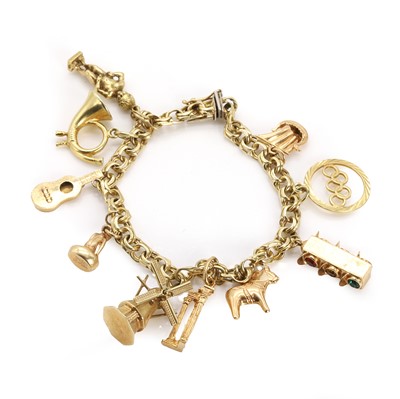 Lot 466 - A gold charm bracelet