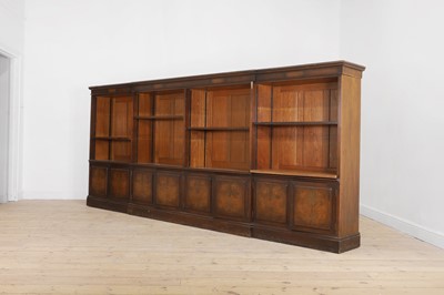 Lot 457 - A walnut open bookcase