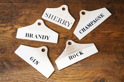Lot 130 - A group of five ceramic wine bin labels