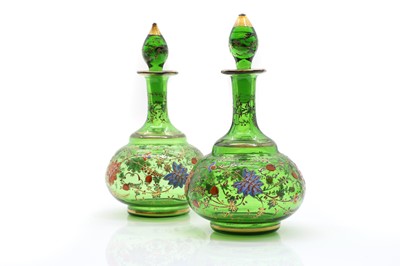 Lot 241 - A pair of Moser green glass scent bottles