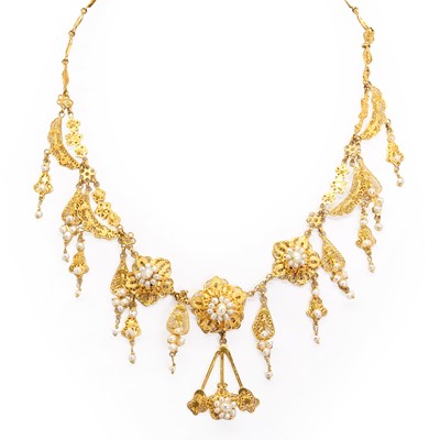 Lot 211 - A Middle Eastern gold and seed pearl filigree necklace