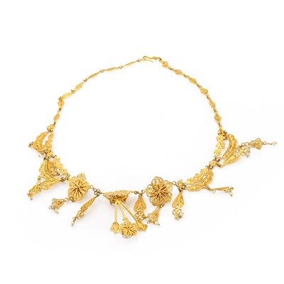 Lot 211 - A Middle Eastern gold and seed pearl filigree necklace