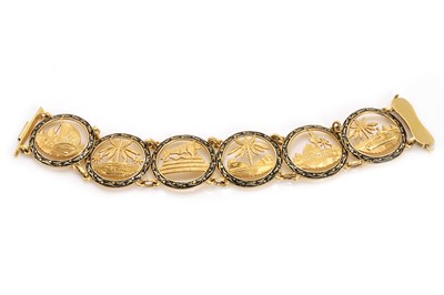 Lot 468 - A gold and enamel bracelet