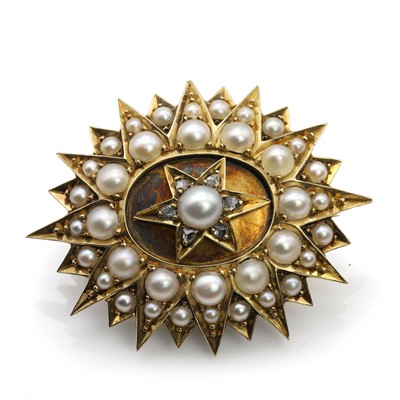 Lot 29 - A Victorian pearl and diamond locket brooch