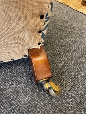 Lot 104 - A pair of open armchairs by Howard & Sons