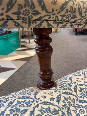 Lot 104 - A pair of open armchairs by Howard & Sons