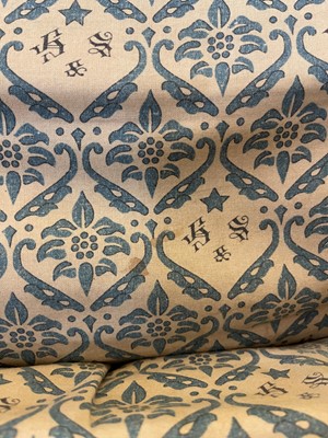 Lot 104 - A pair of open armchairs by Howard & Sons