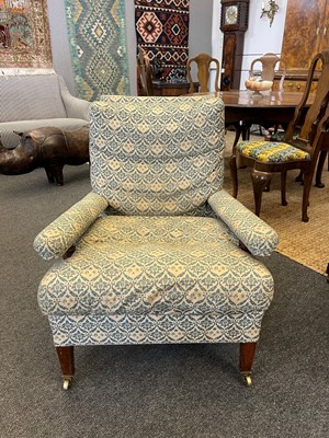 Lot 104 - A pair of open armchairs by Howard & Sons