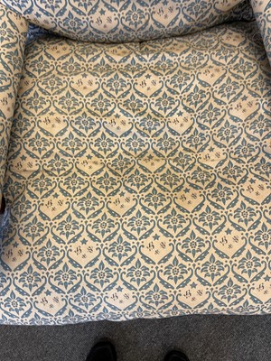 Lot 104 - A pair of open armchairs by Howard & Sons