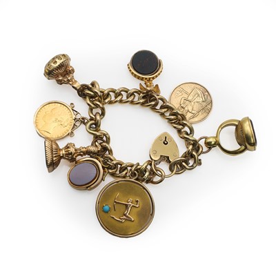 Lot 465 - A 9ct gold charm bracelet