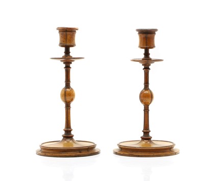 Lot 154 - A pair of treen candlesticks