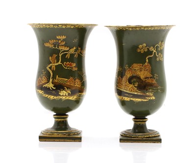 Lot 149 - A pair of Pontypool style lacquer candlesticks