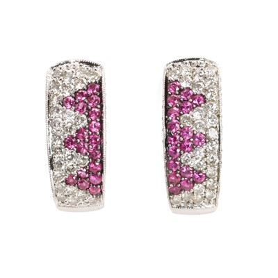 Lot 120 - A pair of white gold pink sapphire and diamond cuff earrings