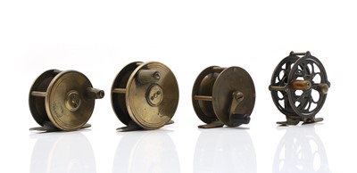 Lot 318 - A group of four brass fishing reels