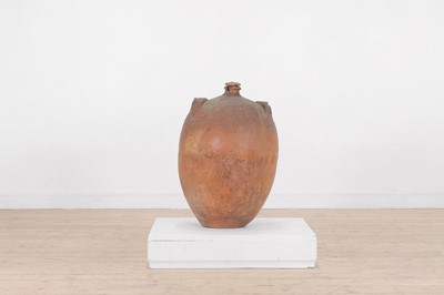 Lot 174 - A terracotta oil pot