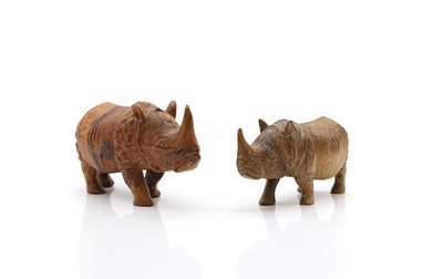Lot 178 - A pair of Indian rosewood carved rhinoceros