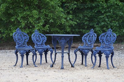 Lot 677 - A set of a painted garden table and chairs in the Coalbrookdale style